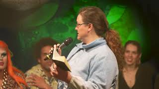 reading from book on stage