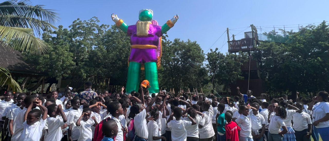 Crowd around giant inflatable space person